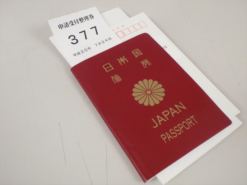 パスポート用の写真は笑顔でも大丈夫だったみたい